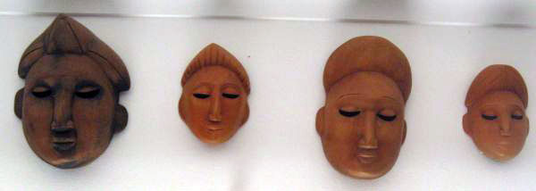 4 wooden heads